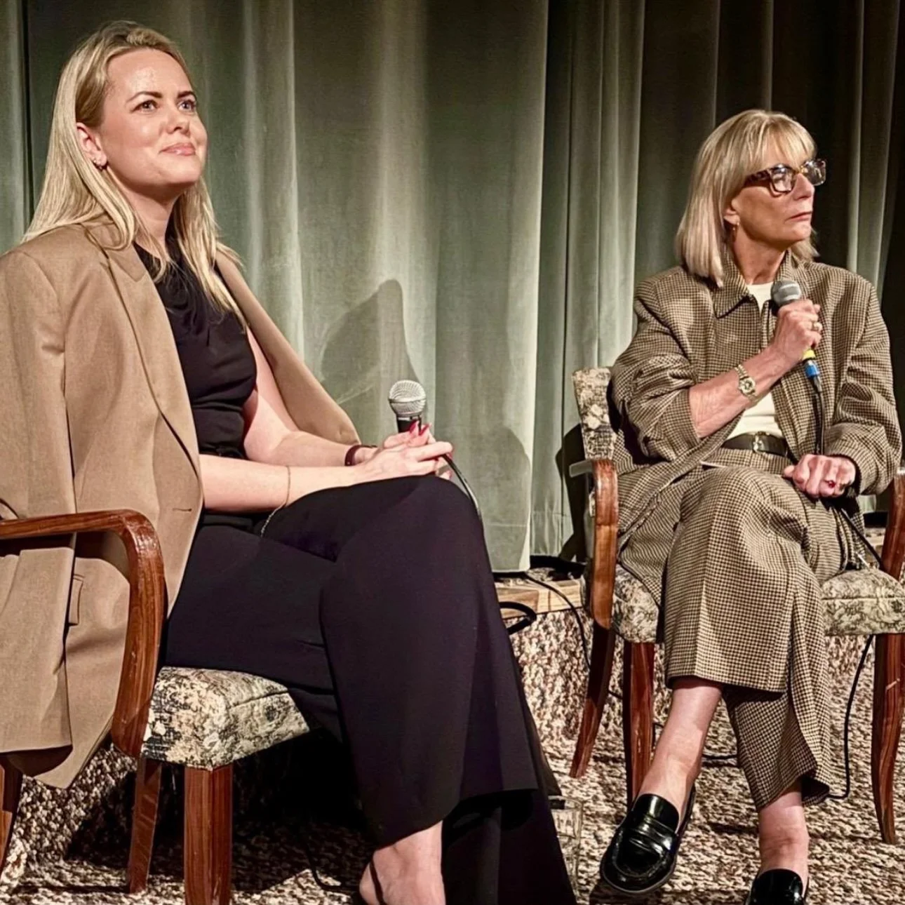 A guest speaks with a microphone during a Prime Time Reset live event conversation