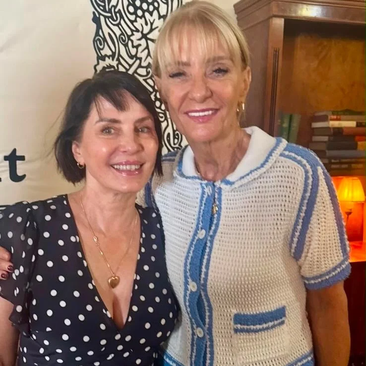 Two smiling guests together at a Prime Time Reset live event